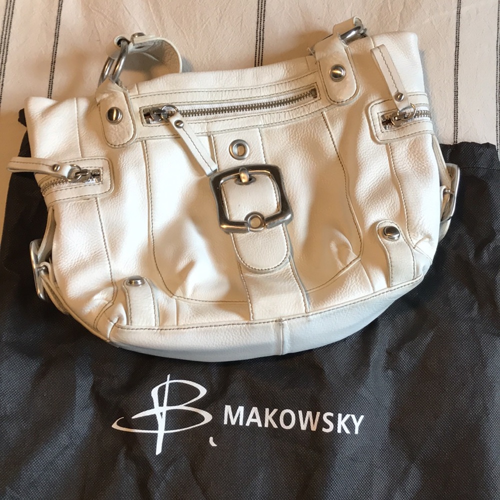 B Makowsky wht shoulder bag, metal embellishments